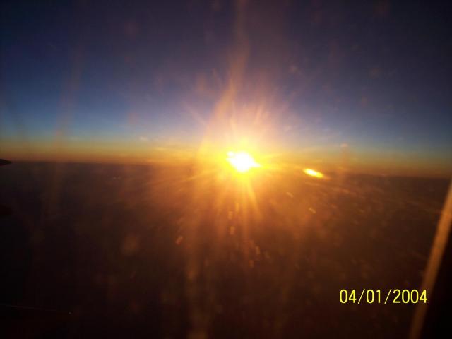slnko z lietadla, západ...